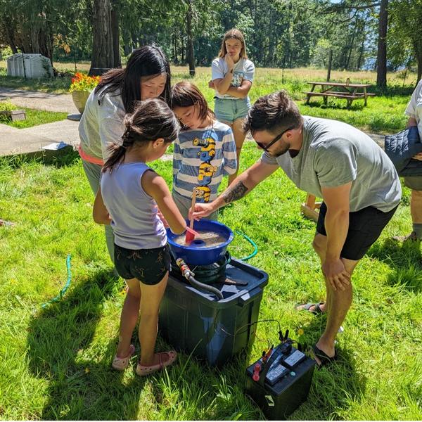 Forage Fish volunteers learning how to process samples