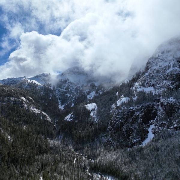 Arial shot of Mount Arrowsmith in the clouds